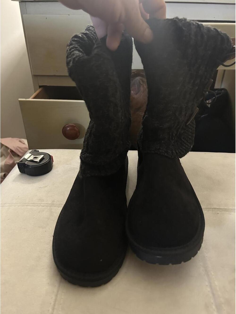 Brand new Black faux fur boots with a cozy, slouchy look. Size US 10.